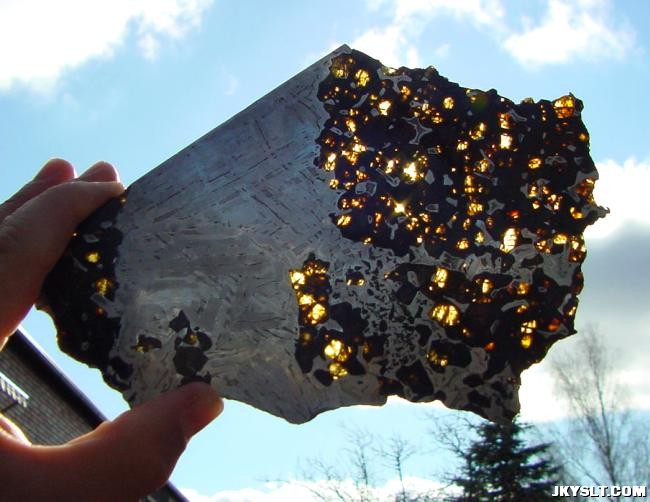 OLIVINES METEORITE PALLASITE SEYMCHAN.JPG